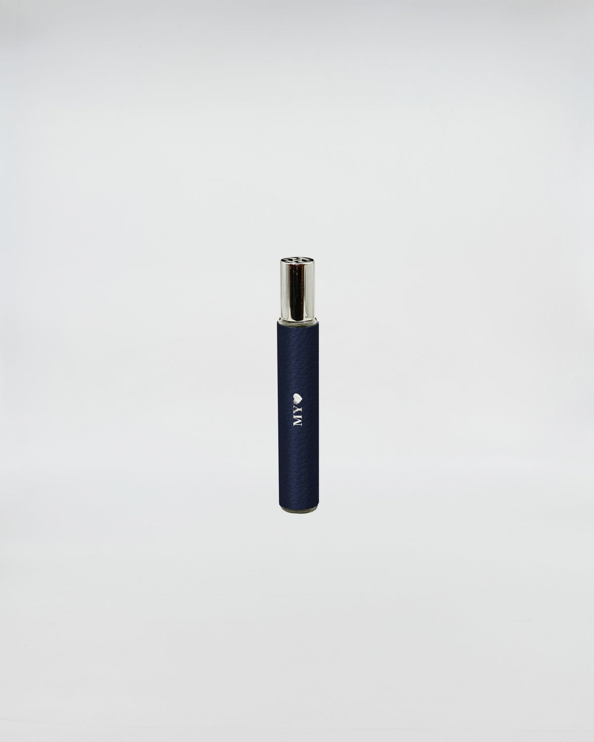 1221 FRAGRANCE BLU spray bottle with a sleek navy design for on-the-go fragrance application.