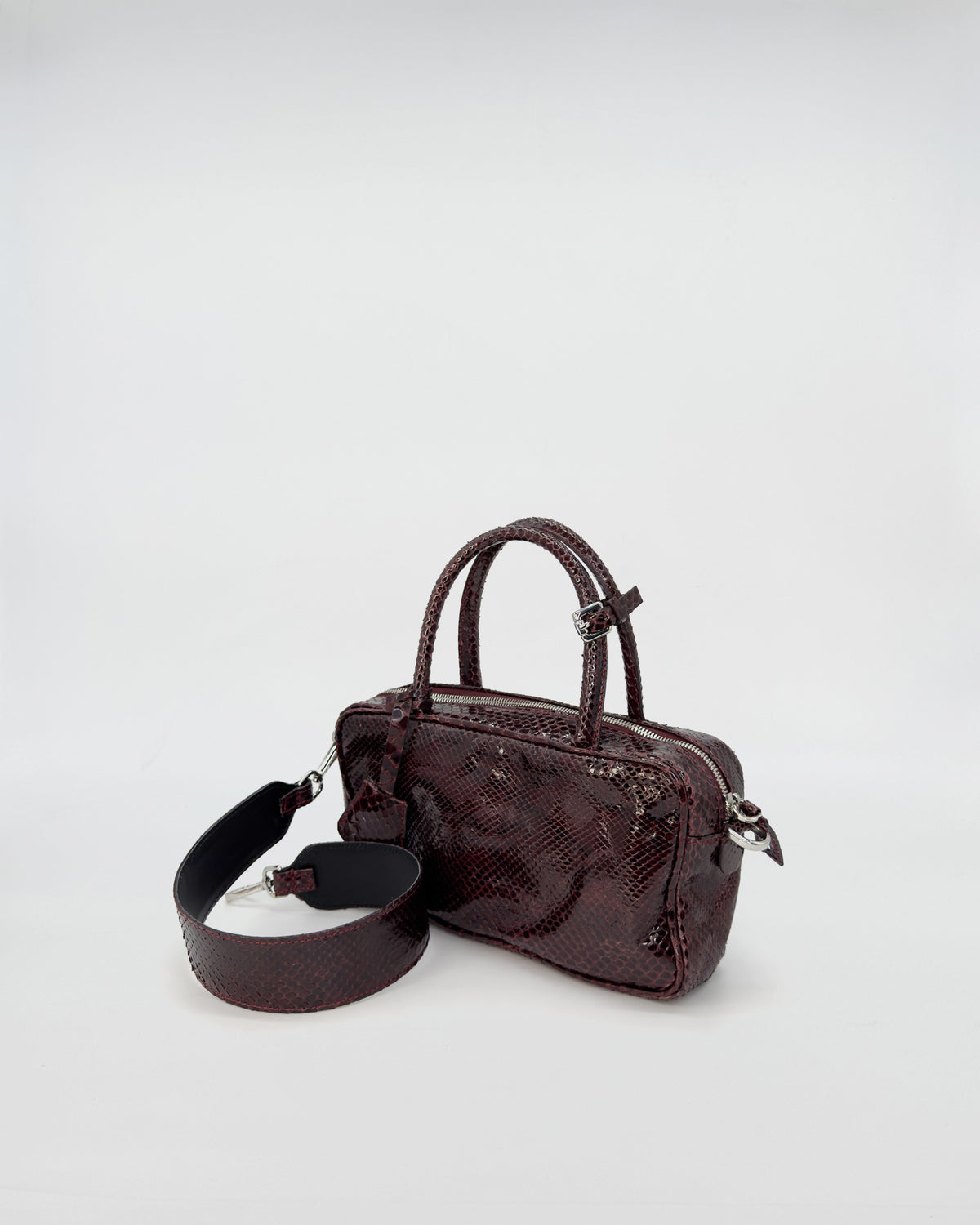 BORSA ASIA PITONE LAVATO EFFETTO VINTAGE con tracolla regolabile in pelle e design elegante.