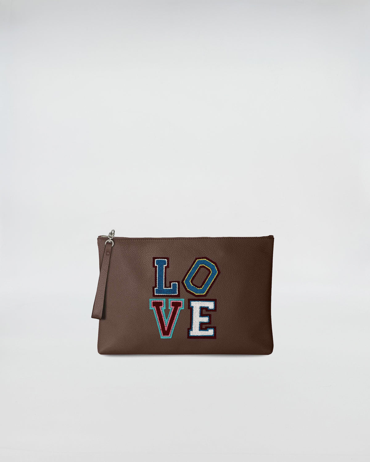 BUSTA A4 LOVE in brown leather with colorful LOVE patch, featuring a zip closure and hand strap.