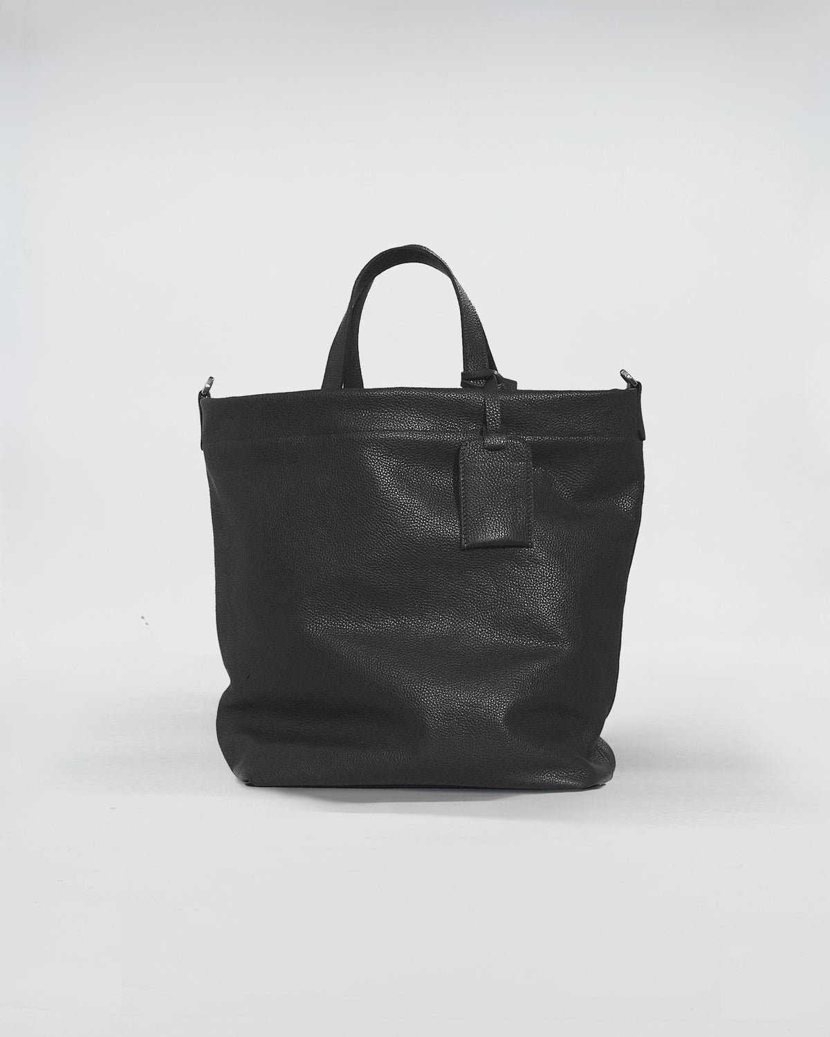 Borsa Ford in pelle nera, versatile con doppio manico, ideale per uso quotidiano e porta PC.