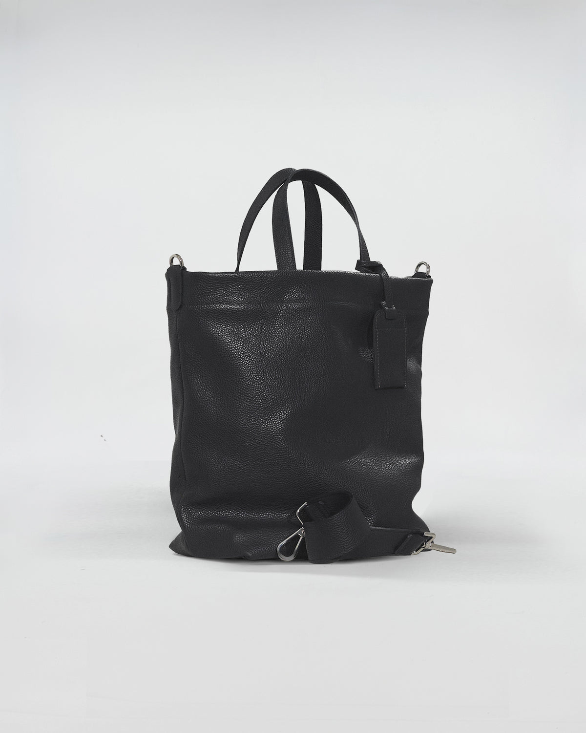Borsa FORD in pelle nera, design elegante con doppio manico e manico a spalla per uso quotidiano.