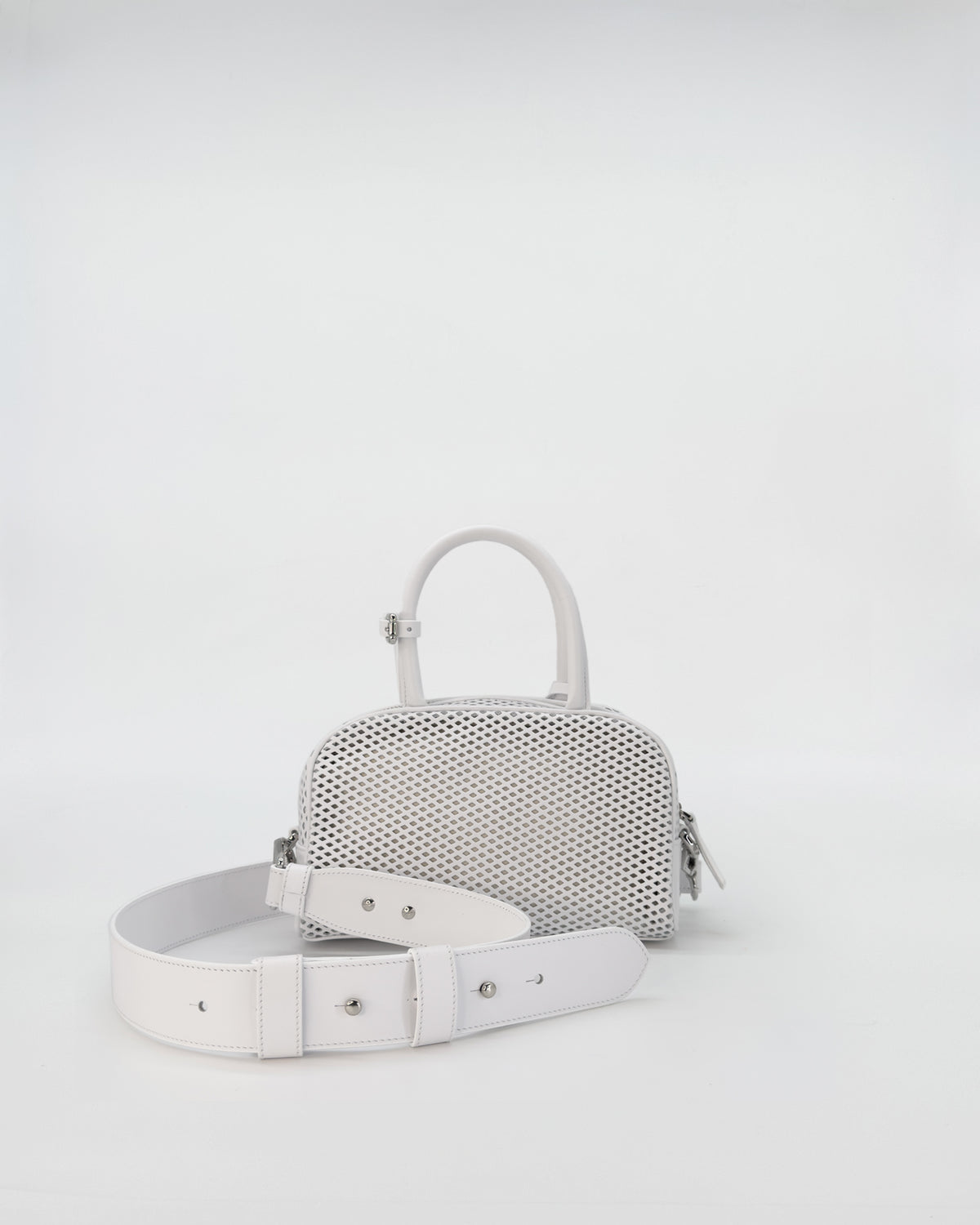 ZOE MINI VITELLO FORATO, mini handbag with perforated design, stylish accessory with removable shoulder strap.