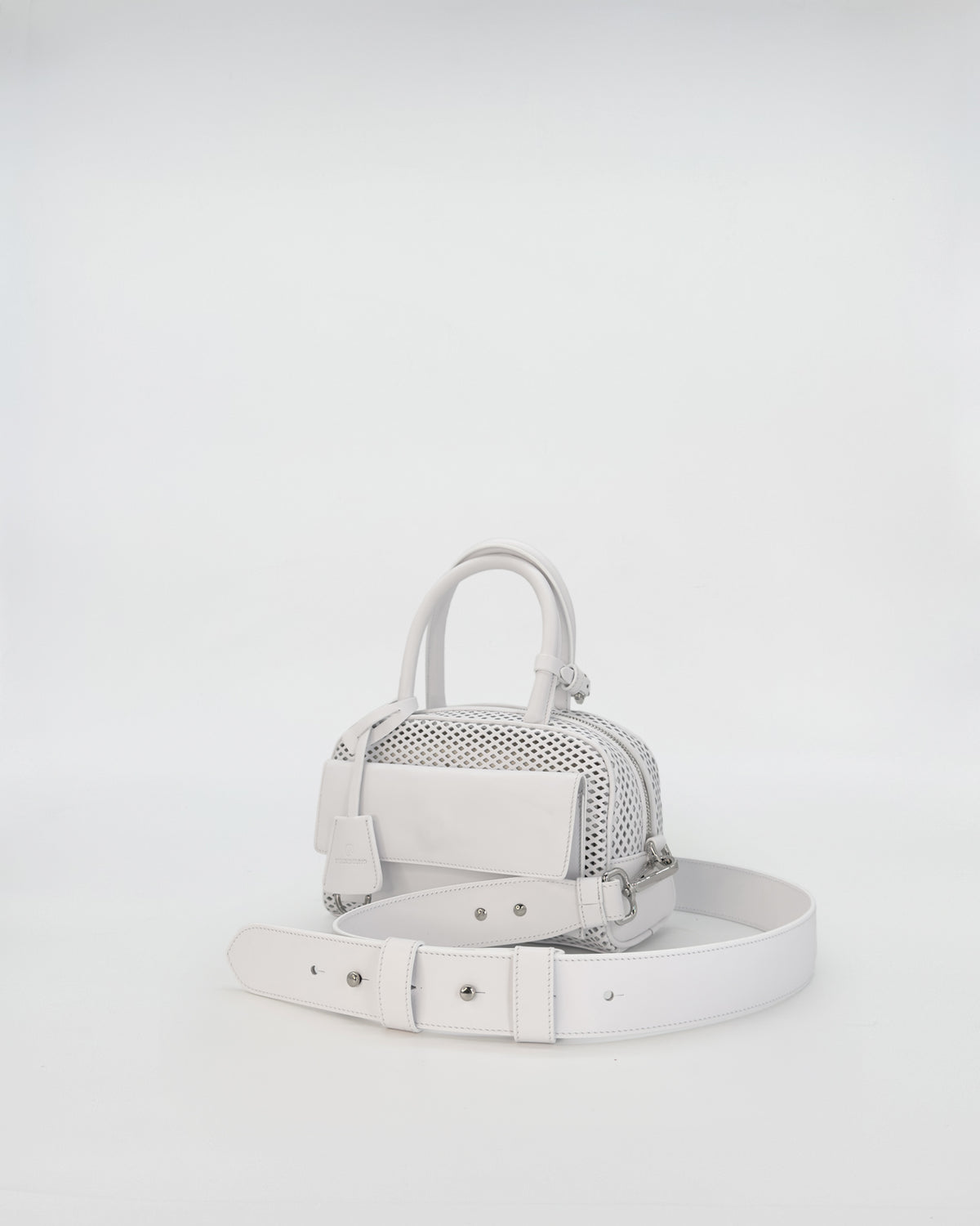ZOE MINI VITELLO FORATO, handbag in white with perforated detail and adjustable strap.