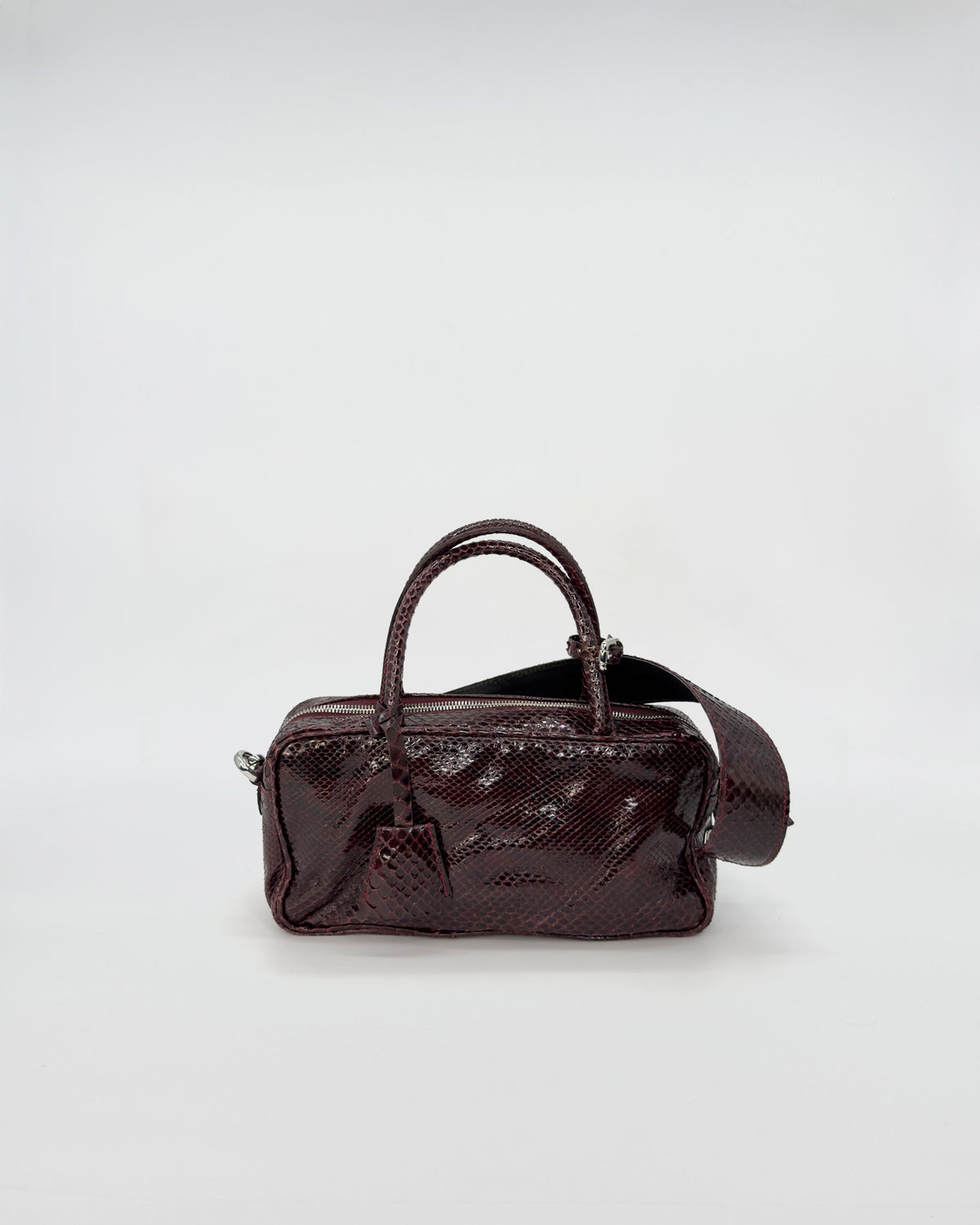BORSA ASIA PITONE LAVATO EFFETTO VINTAGE in pitone lavato con tracolla regolabile e manici, elegante e cool.