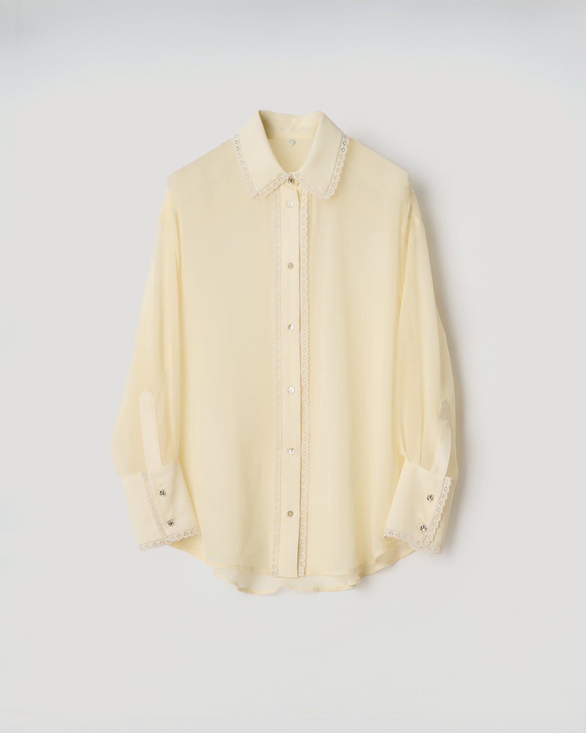 CAMICIA ISOTTA SETA CON PIZZO in georgette seta gialla con inserti in pizzo e bottoni gioiello.