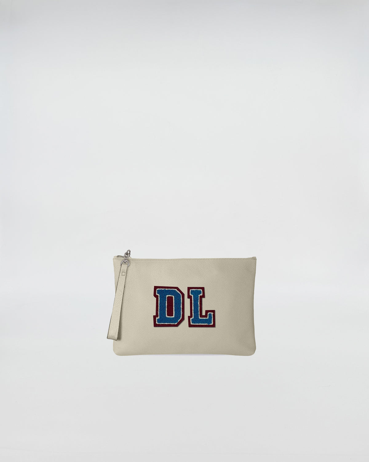 POCHETTE JOY PERSONALIZZATA with personalized patch and zip closure, crafted in soft leather.