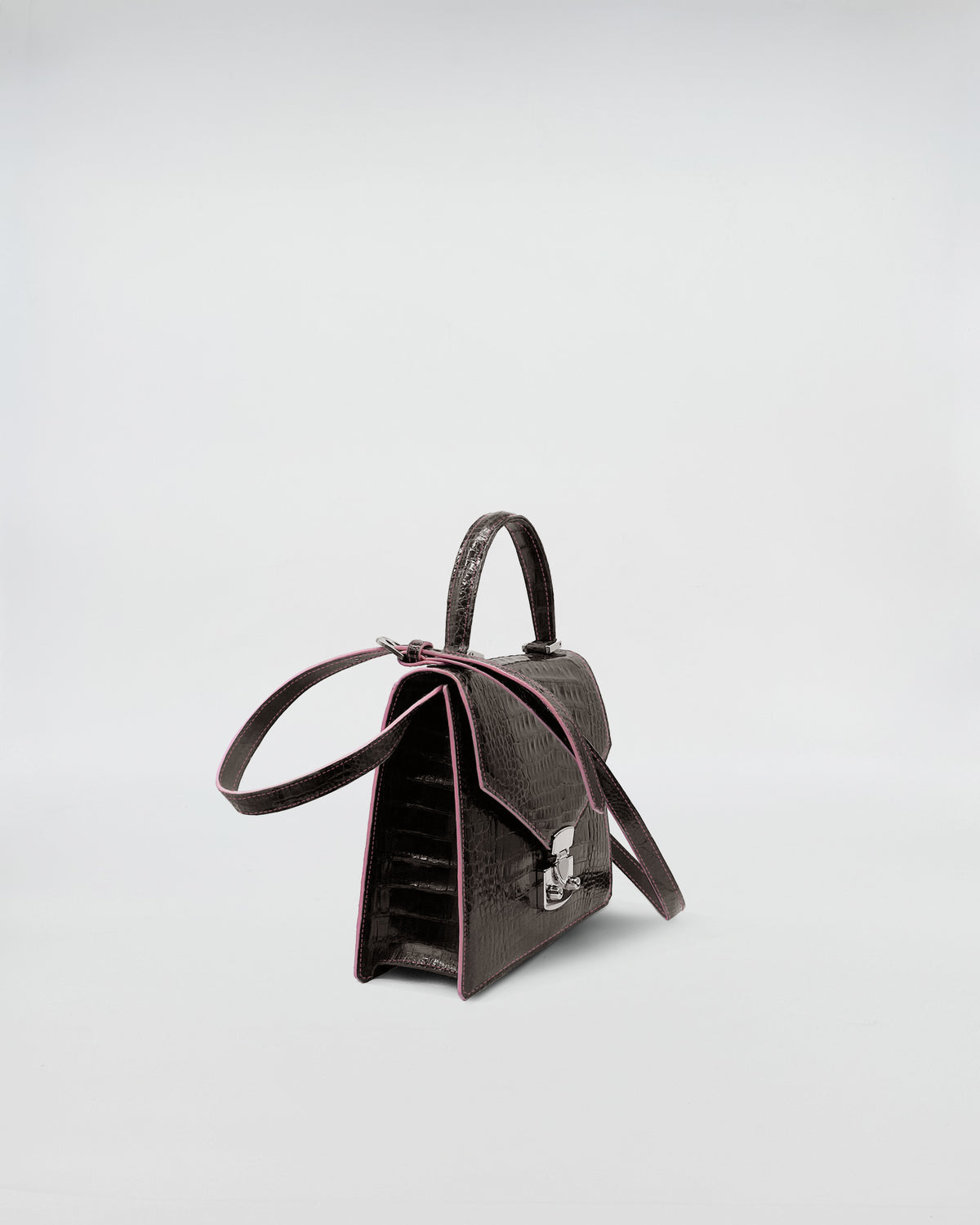 Lady D - Cocco Recycle handbag featuring recycled crocodile leather and suede interior.