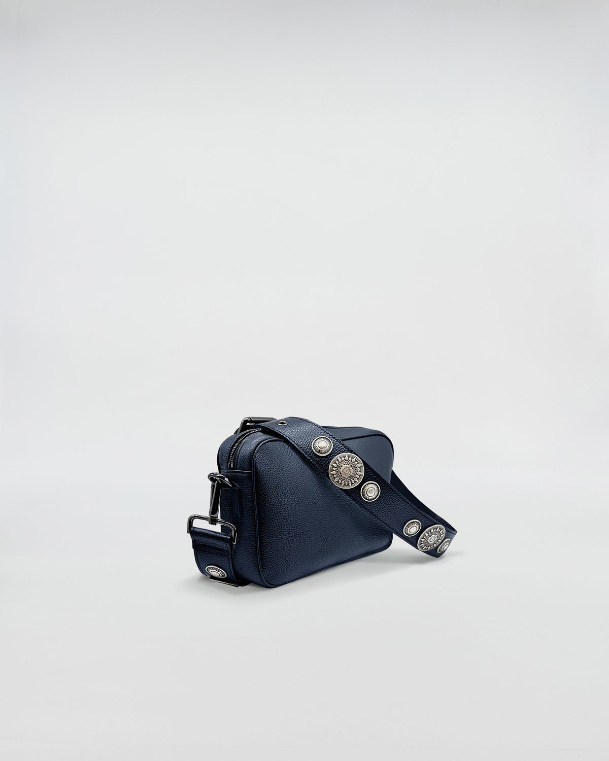 MAFALDA ROCK stylish navy bag with decorative silver studs and adjustable strap for versatile use.