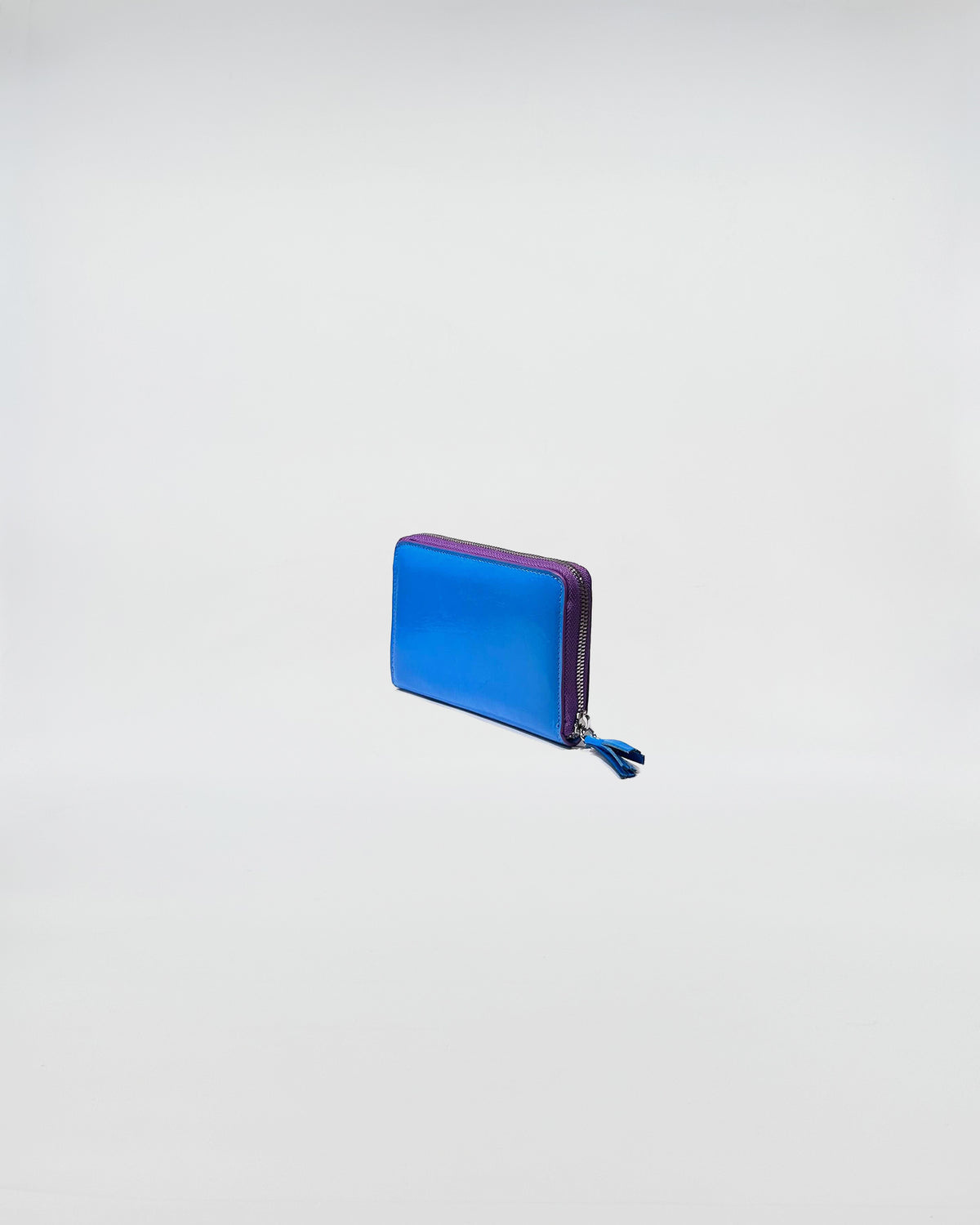 PORTAFOGLIO ZIP SMALL in blue and purple with zip closure, featuring a sleek design for cards and cash.